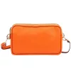  Dámska kožená kabelka cez rameno Luka 26-088 mandarínkovo oranžovej farby, crossbody 22 x 13 x 7 cm